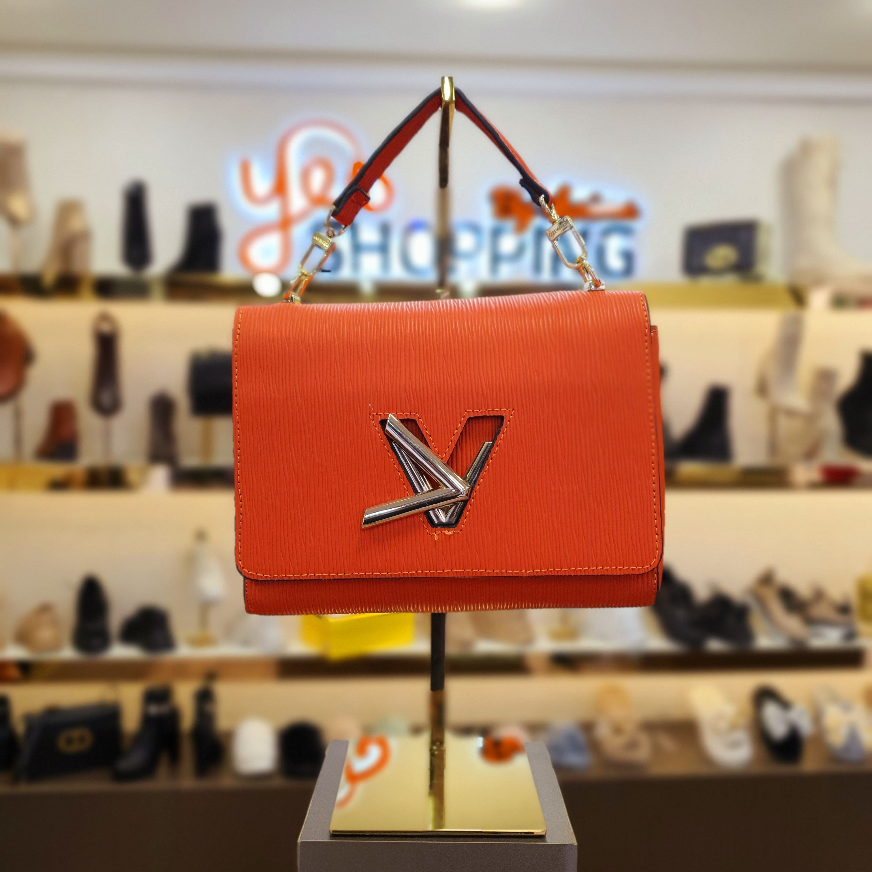 Sac louis 2024 vuitton chaine orange