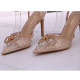 Escarpins à talons aiguilles en transparent avec strass